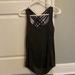Sports bra connected to a tank top